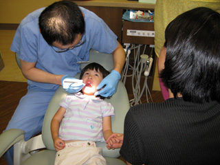 eleanor having her teeth examined