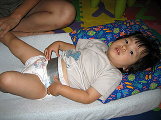 duct taping miranda's diaper