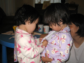 miranda helping eleanor with her buttons