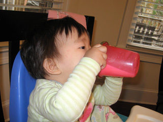 miranda drinking milk from a cup