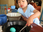 Eleanor Coloring a Green Egg