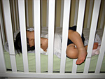 Eleanor Tangled in the Crib