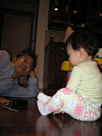 Miranda on the Floor with Her Grandfather