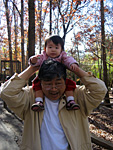 Miranda on Her Grandfather's Shoulders