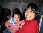 Miranda with Agnes on the Plane