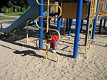 Miranda Hanging on the Playground