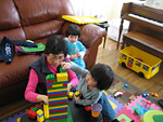 Grandmother Playing with Blocks