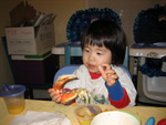 Miranda Eating Crab