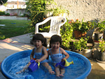 In the Pool with Watering Cans