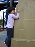 Eleanor Climbing the Playground Structure