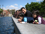 Miranda, Eleanor, and Bernard at the Fountain