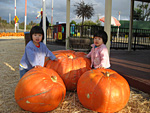 Standing with Pumpkins