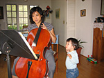 Effy Playing the Cello for Miranda