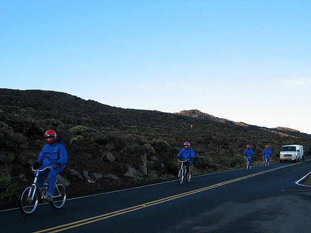 bicyclists coming down the mountain