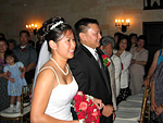 jeannie and allan walking down the aisle