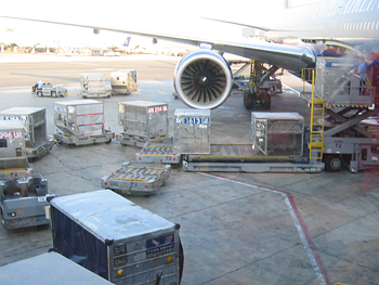 unloading cargo from an airplane